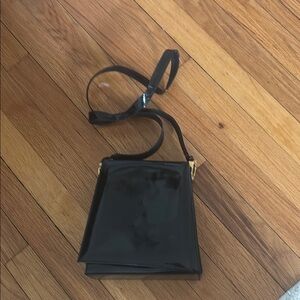 Stewart Weitzman black patent crossbody bag